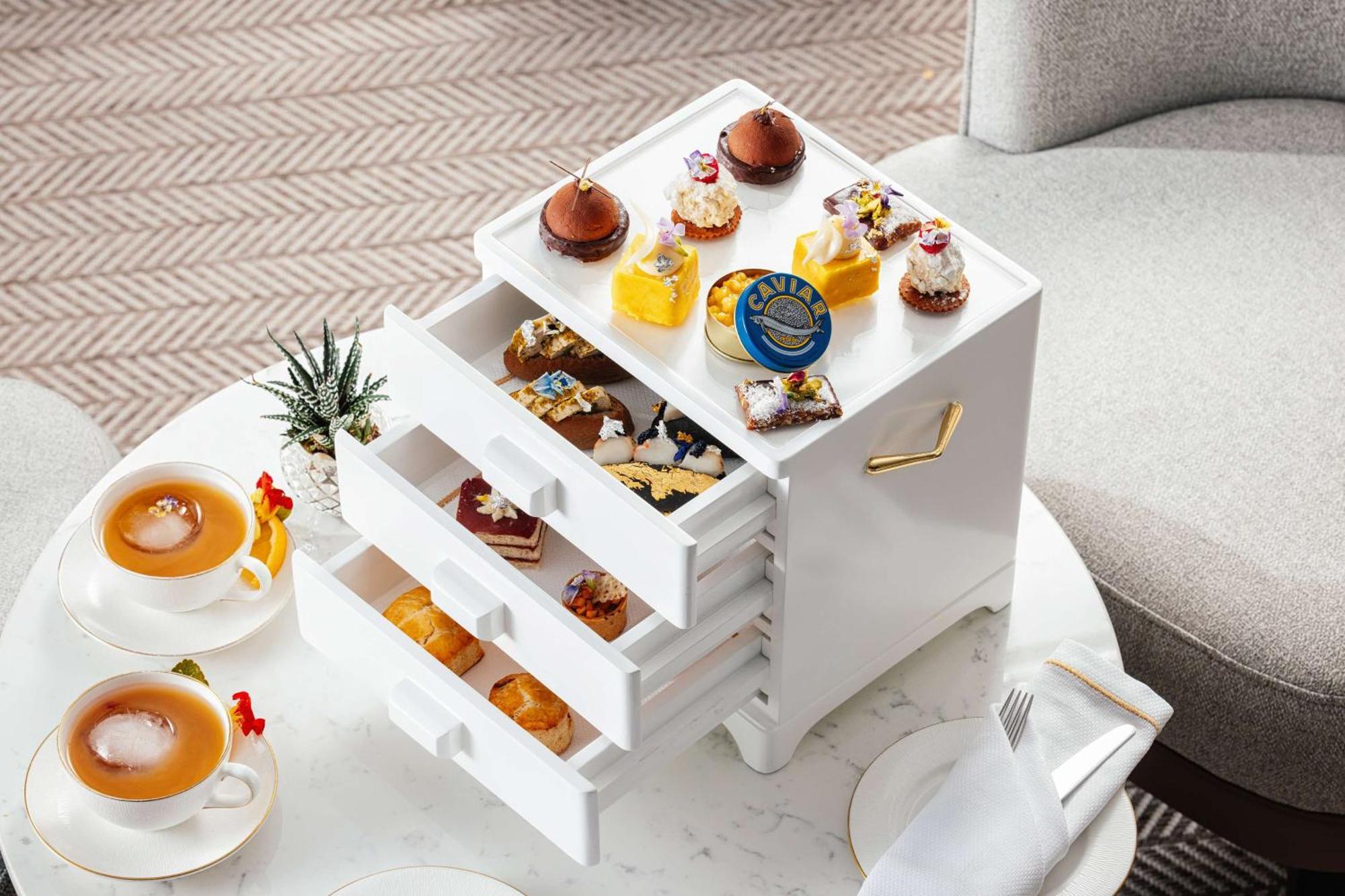 Kempinski The Boulevard Dubai Exterior photo Afternoon tea at The Ritz-Carlton, Hong Kong