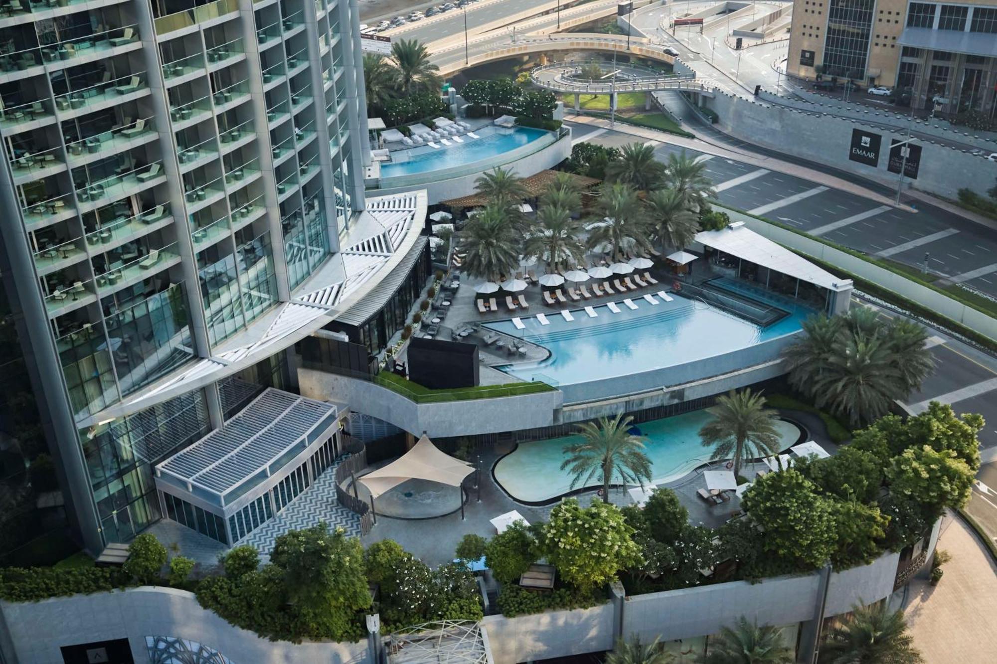 Kempinski The Boulevard Dubai Exterior photo The swimming pool at the complex